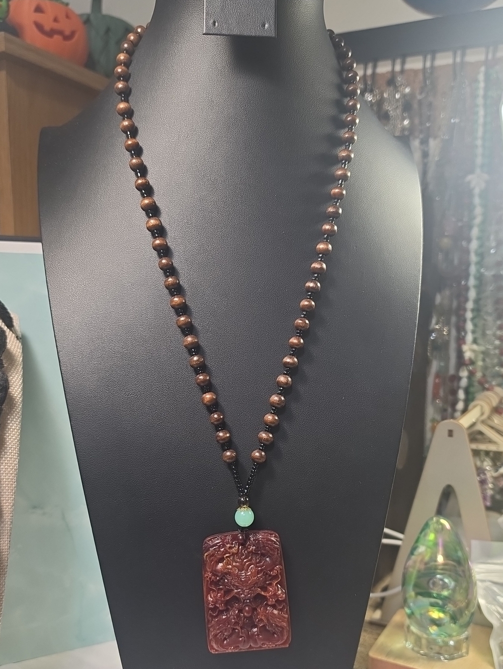 Beaded Brown Wood Necklace with Carved Red Pendant